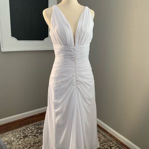 Beautiful white midi dress, cute braided shoulder straps and bead detail.